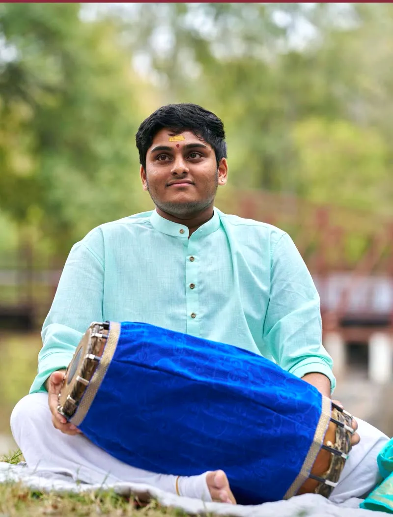 Chidatma with mridangam — outdoor portrait